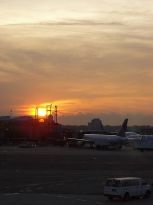 The sun sets over the gates at Newark's Liberty airport while waiting for the Belfast flight to board.