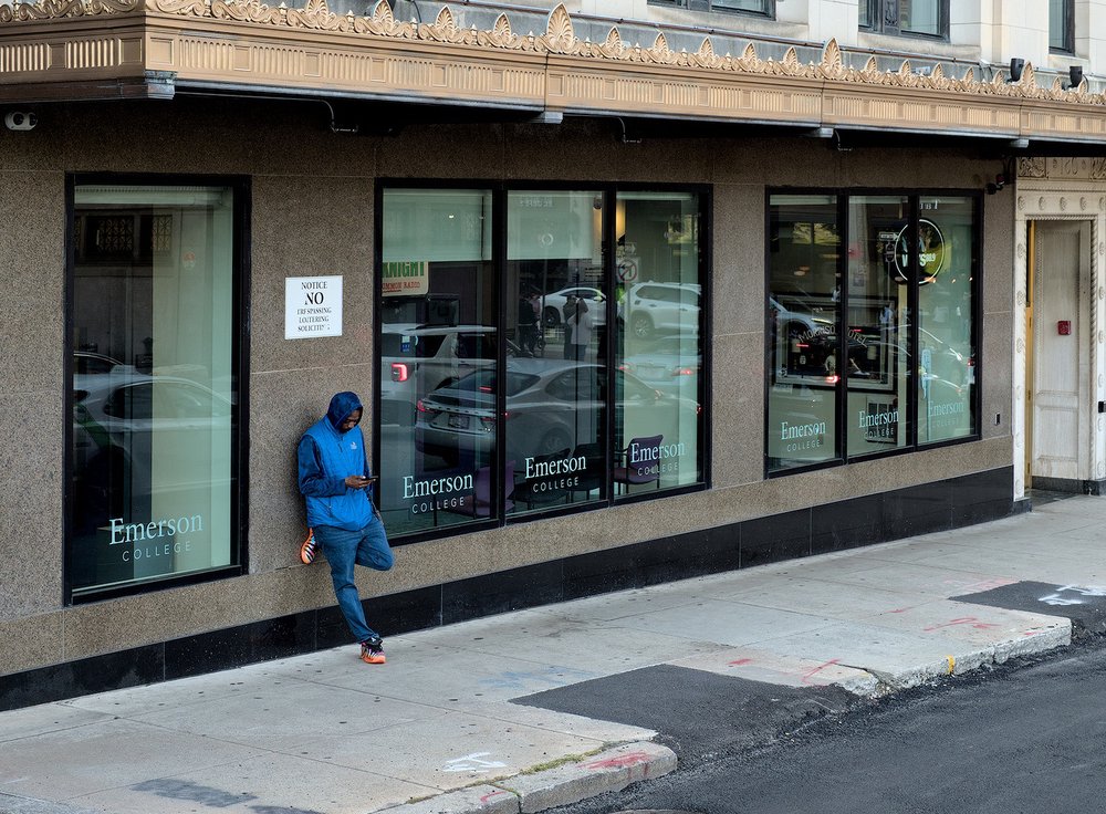 Don’t worry, he wasn’t actually loitering. Just stopped for a moment to check his phone.