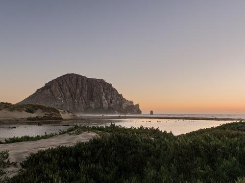 A view of Morro Rock, Morro Bay, California taken at sunset.